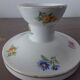 Old candle holder in flowered porcelain