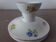 Old candle holder in flowered porcelain