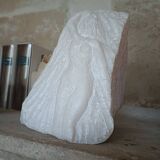 Bust of a woman in a block of alabaster