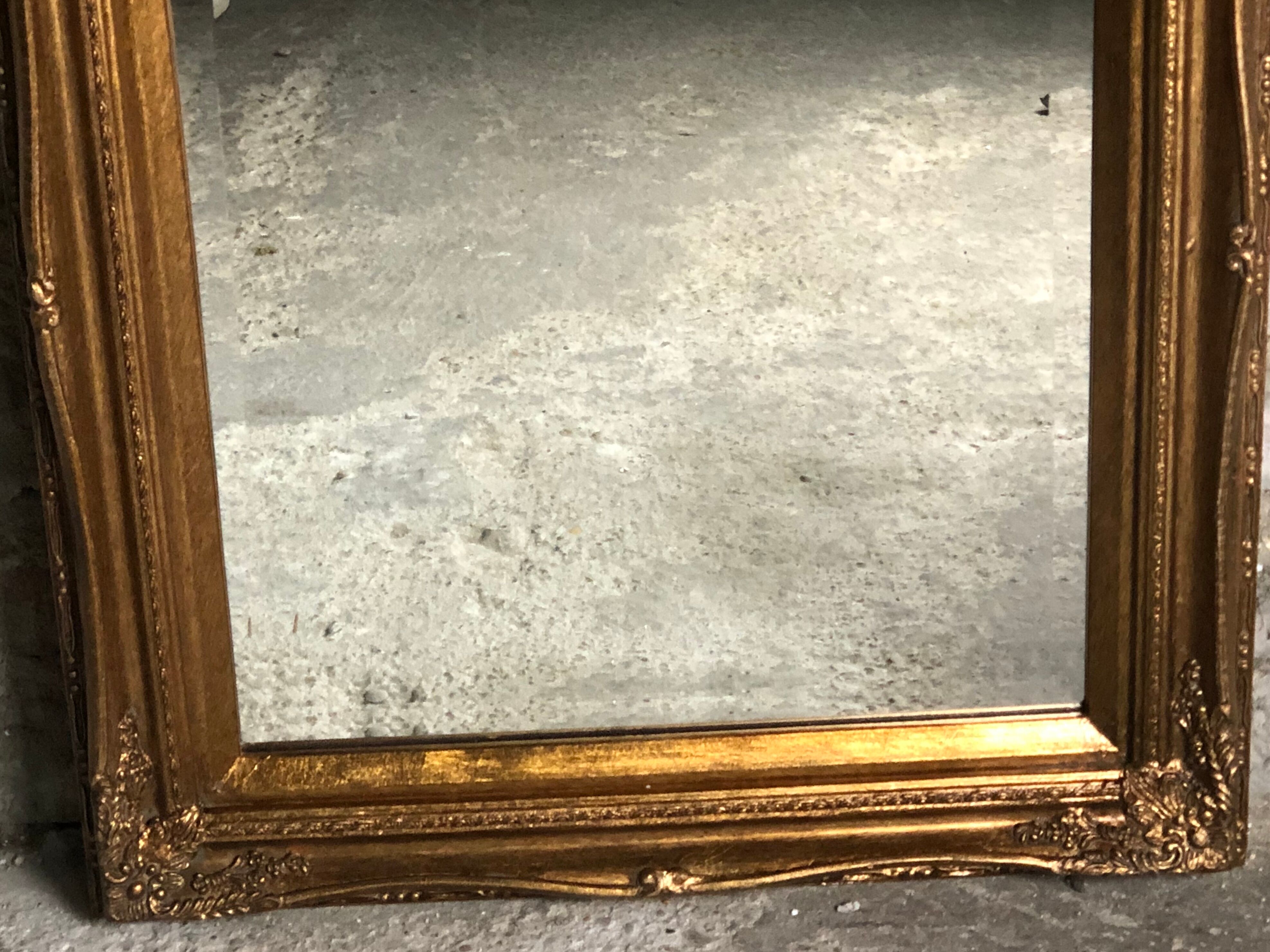 Oval mirror style Louis XV patinated gold 63 x 53 cm