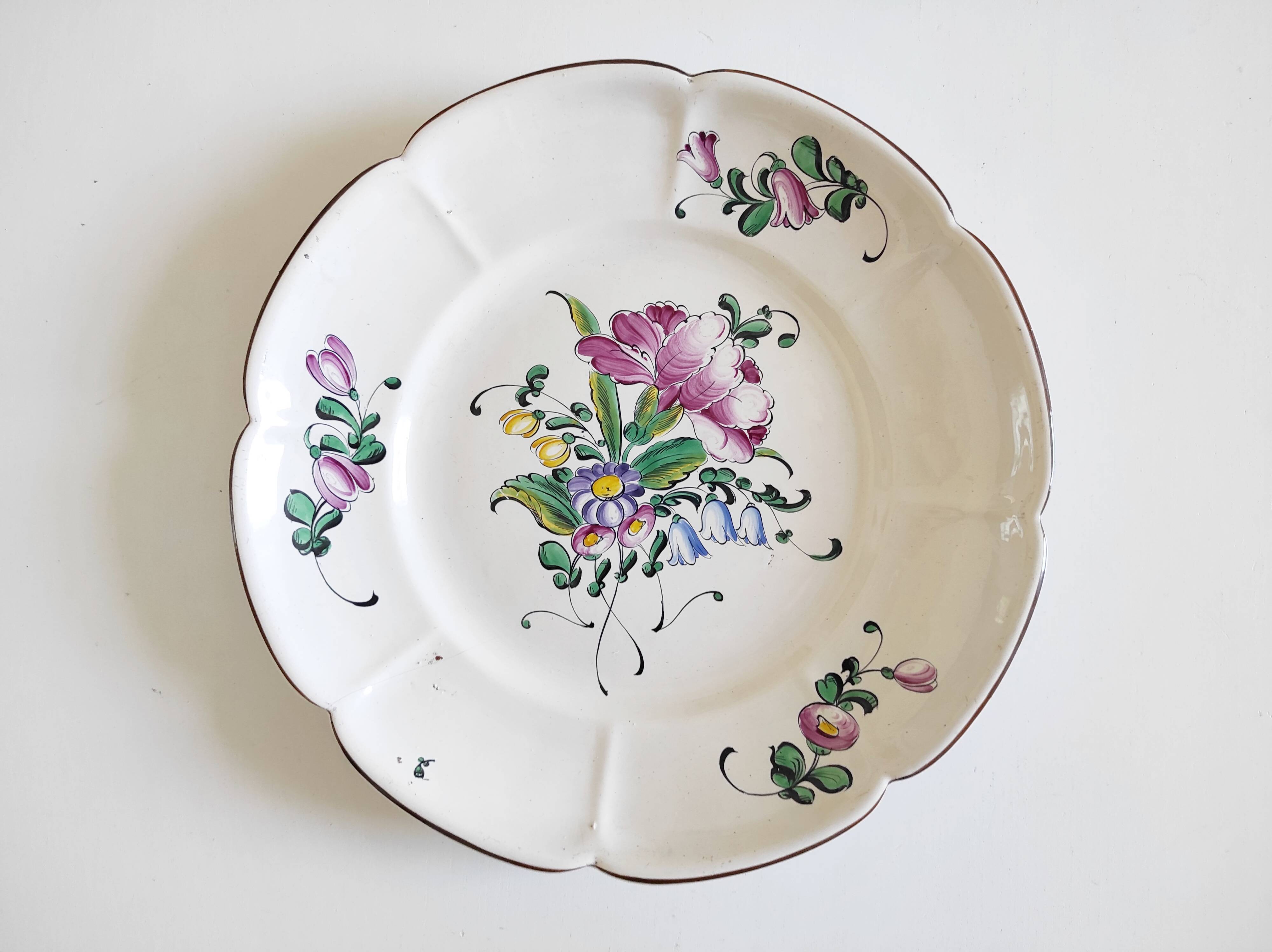 Eastern earthenware plate with flowers
