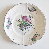 Eastern earthenware plate with flowers