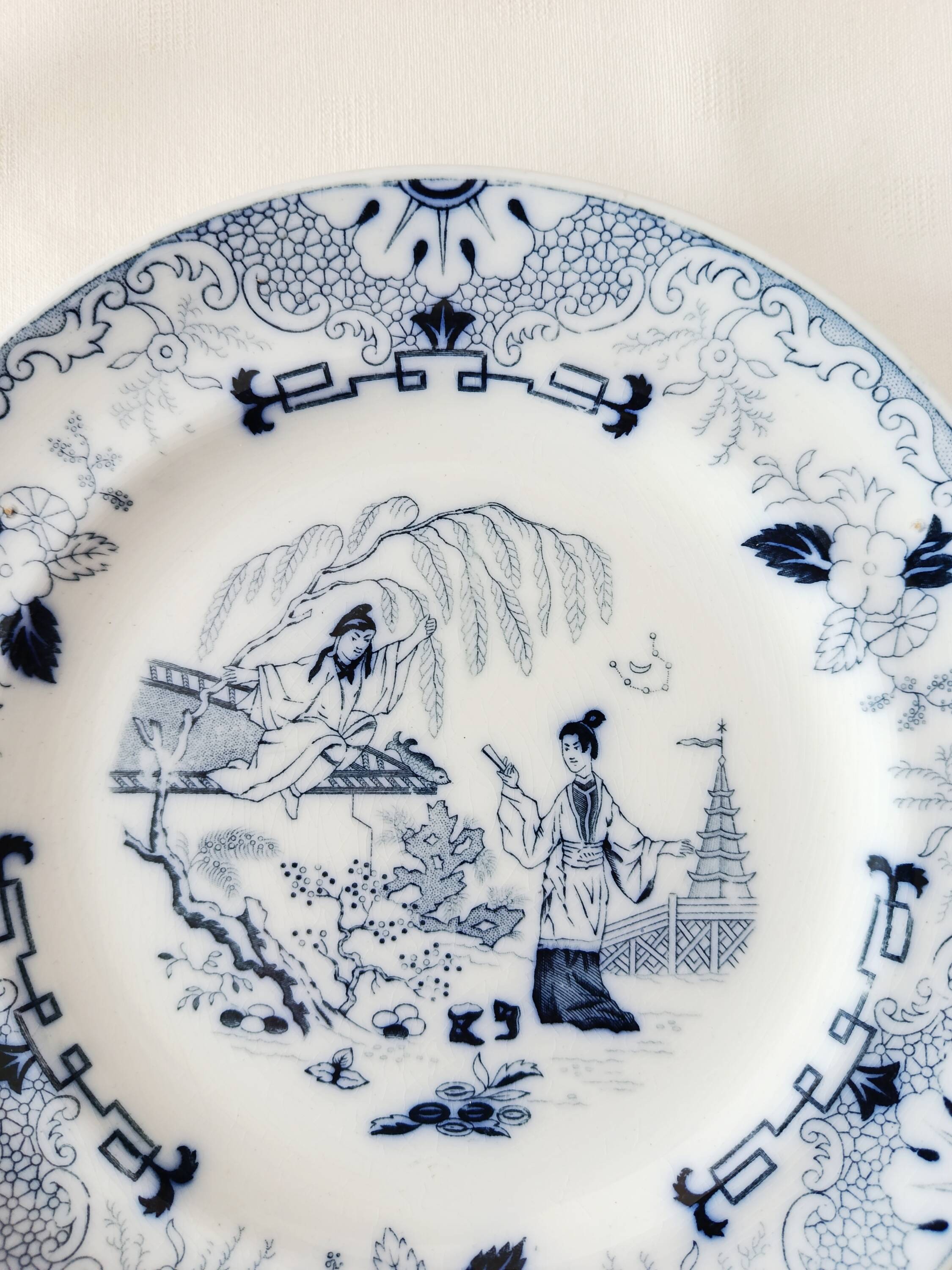 Set of 2 flat plates Petrus Regout, Timor