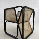 Cubic armchair in black rattan and canework