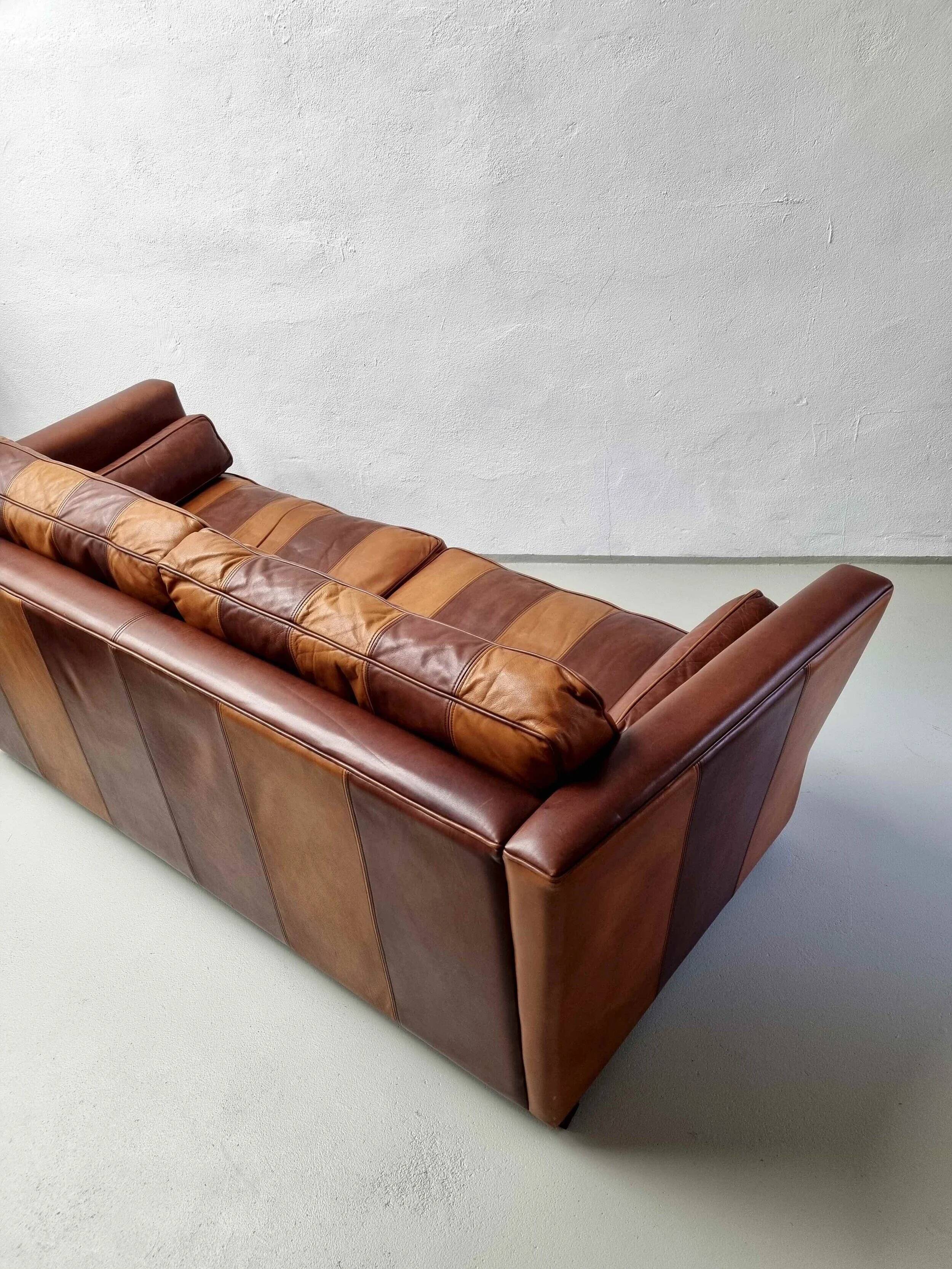 Vintage striped brown orange leather sofa (210 cm x 88 cm)