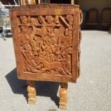 Compact 4-drawer ethnic chest of drawers carved with scenes of African life