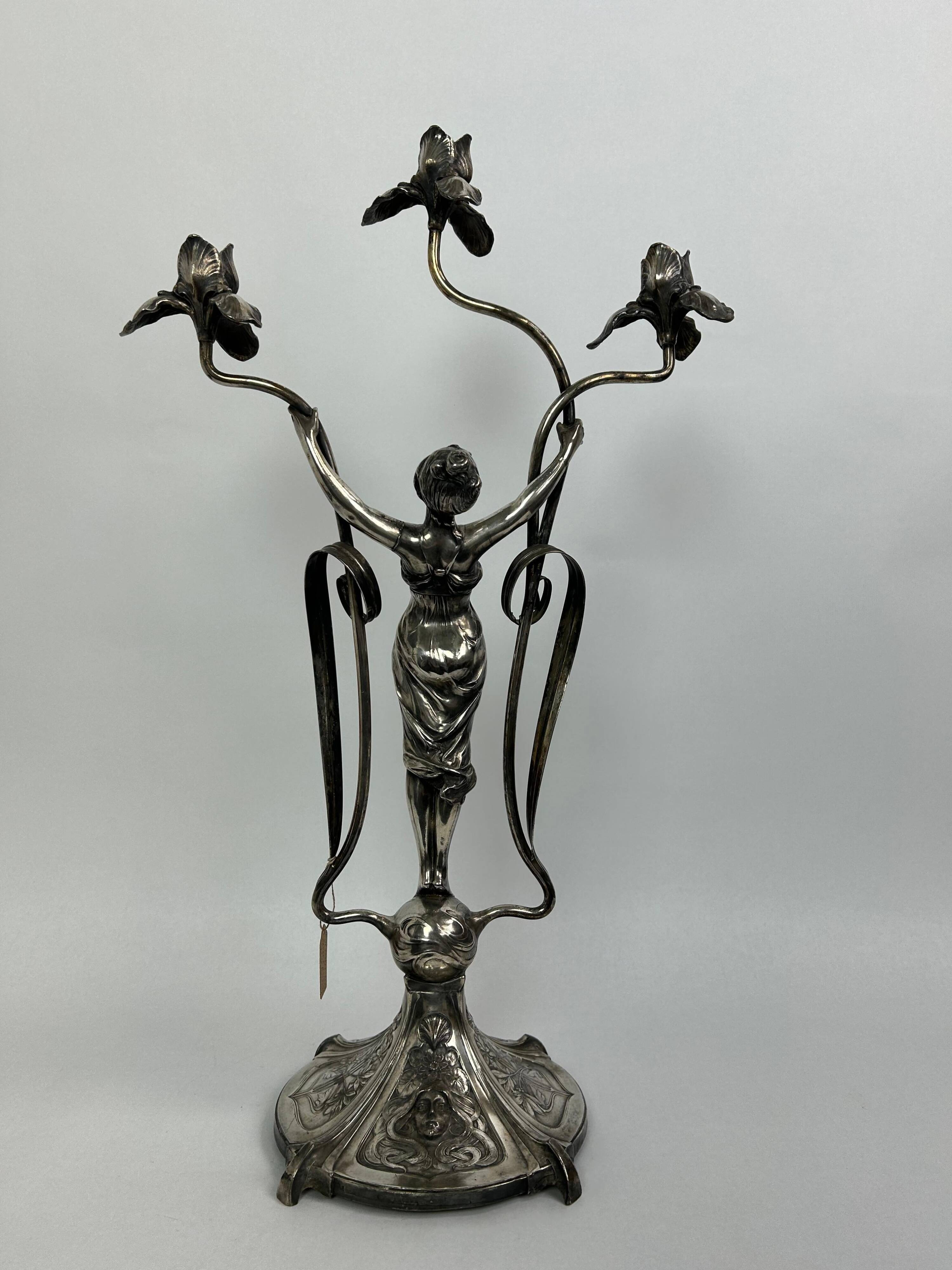 Large figurative chandelier with a femme fatale nymph.