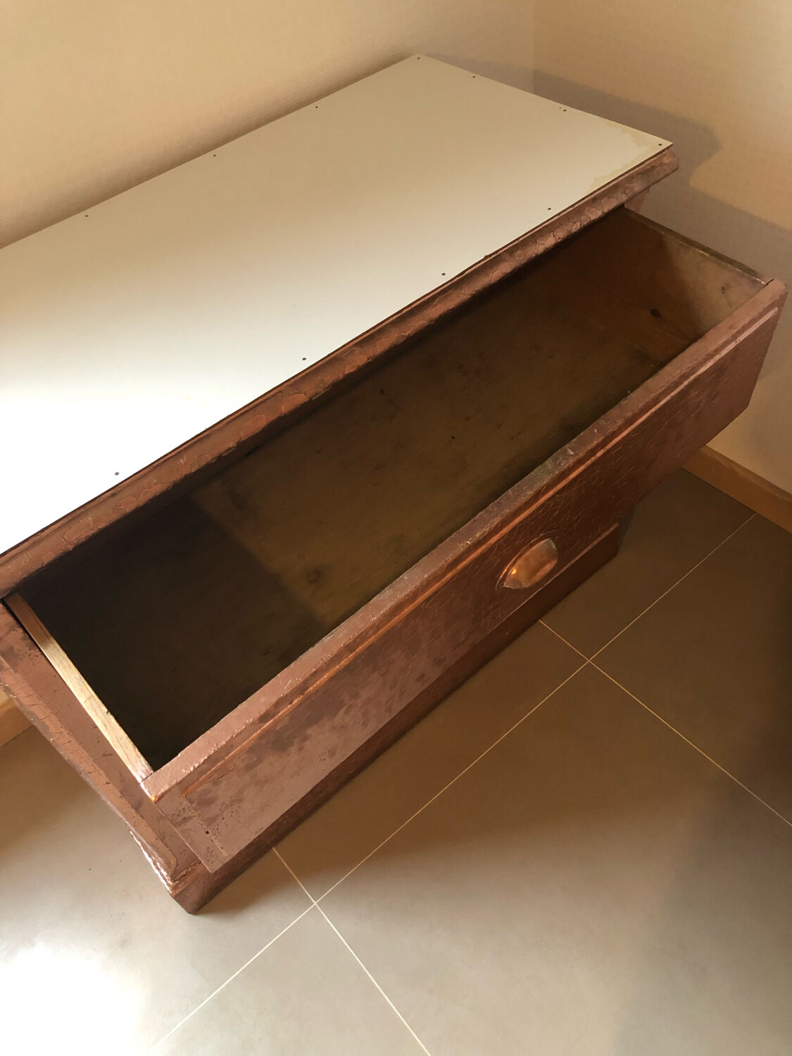 Old chest of drawers restored golden copper color