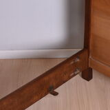 Wooden bed, early 20th century.