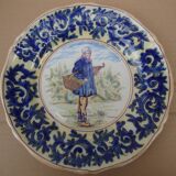 Old earthenware plate decorated with a character marked Le HAVRE
