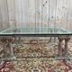 Coffee table with Corinthian columns and glass top