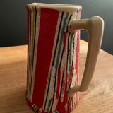 Earthenware pitcher covered with paper