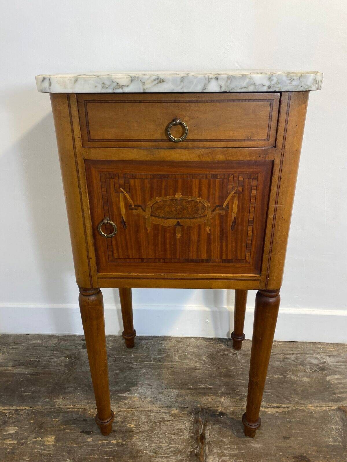 Louis XVI style bedside table, with a marble top and marquetry.