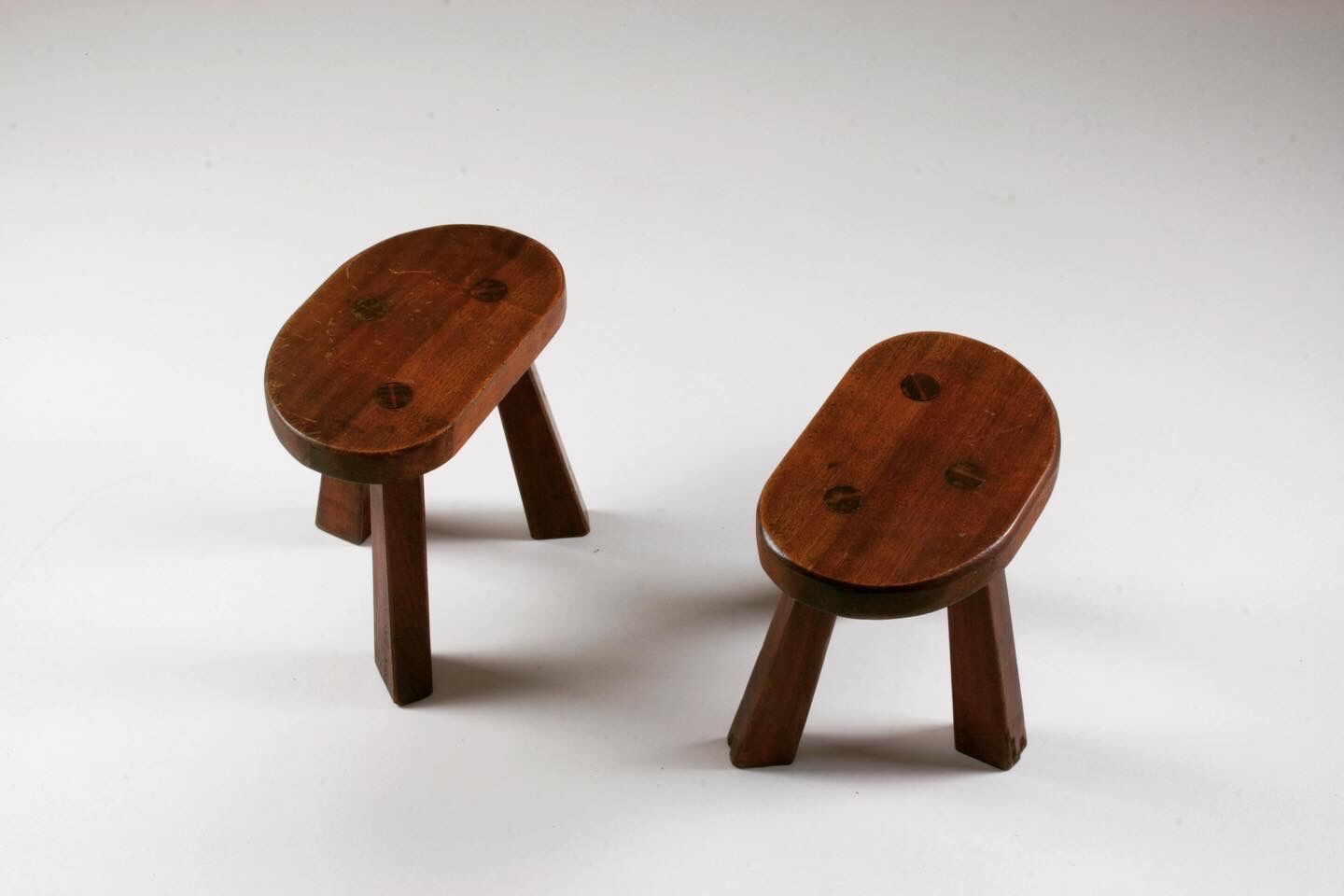 Pair of tripod brutalist stools, France 1950s