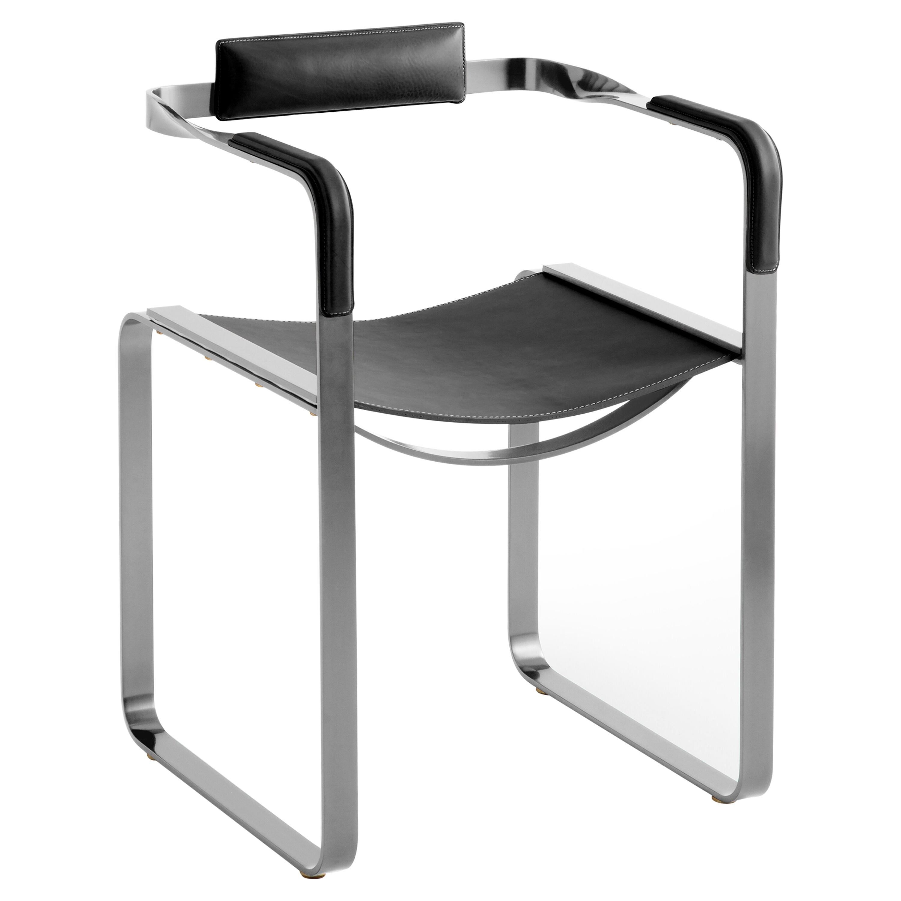 Armchair, silver steel and black leather, contemporary style.