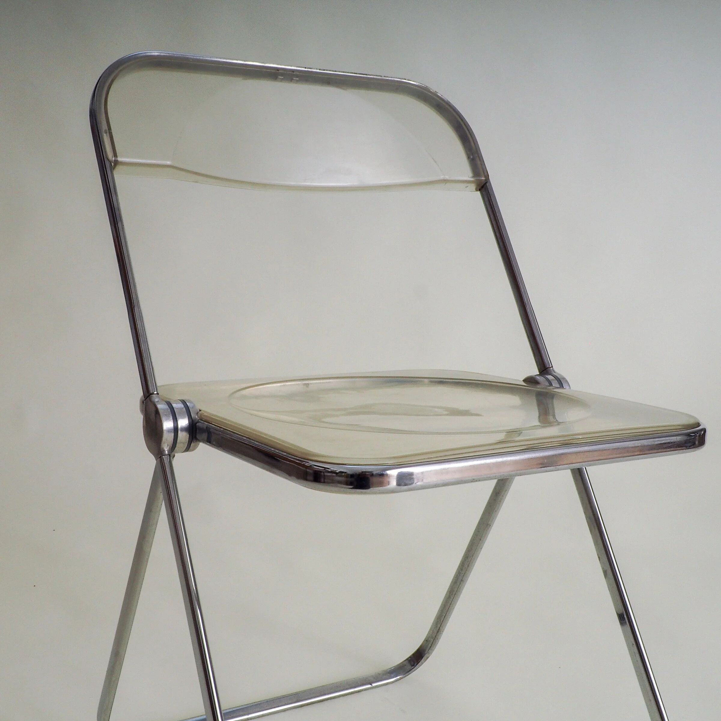 2 Plia folding chairs by Giancarlo Piretti for Anonima Castelli