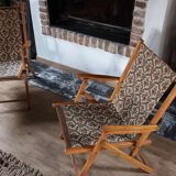 Two vintage folding armchairs