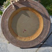 Miroir rond en céramique signé