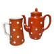 Sarreguemines, two red earthenware jugs with polka dots circa 1940