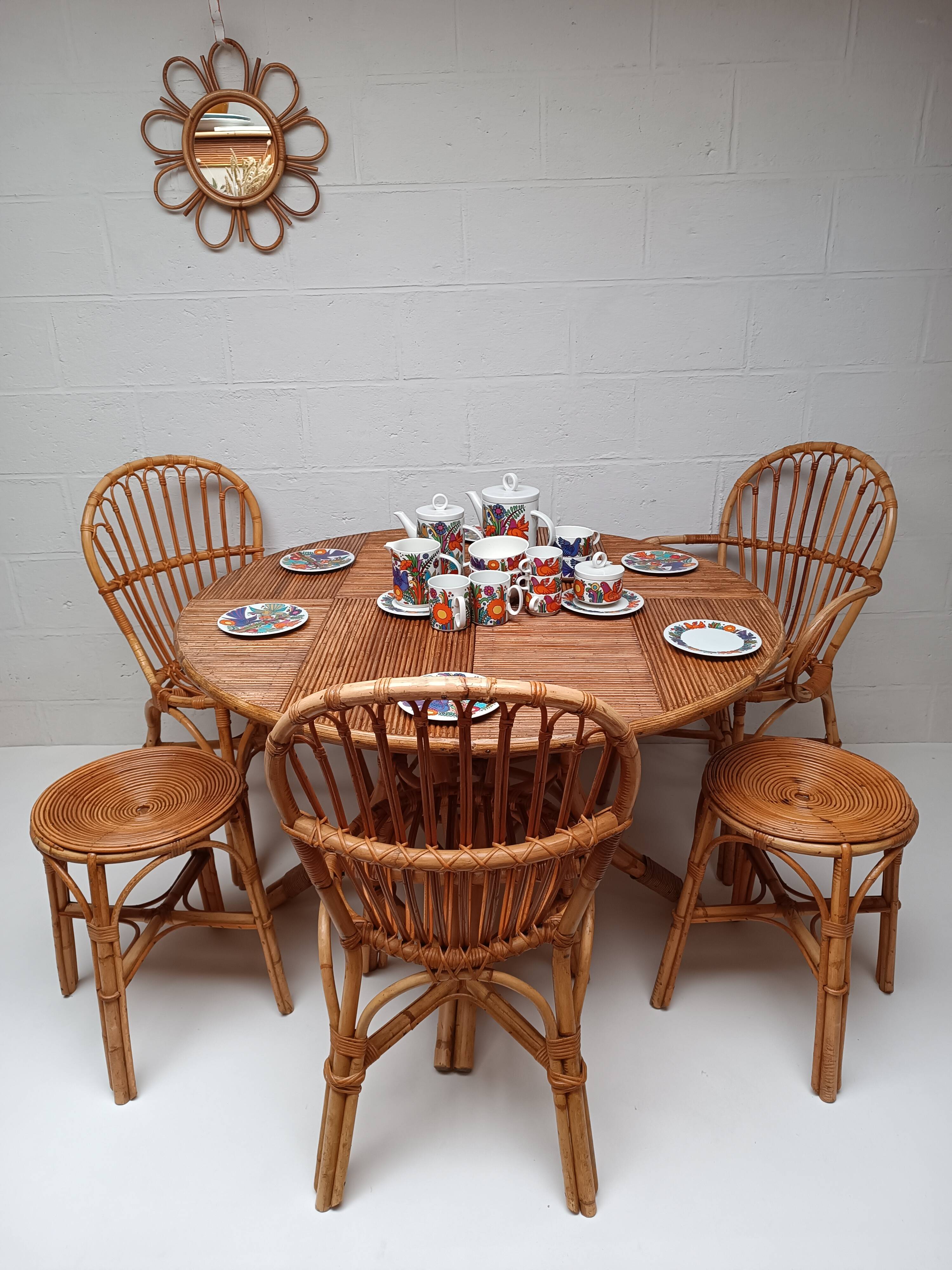 Bamboo table with extensions, 3 chairs and 3 stools from the 1960s.
