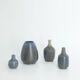 Set of 4 Mid-Century Scandinavian collectible vases in blue and brown stoneware by Gunnar Borg.