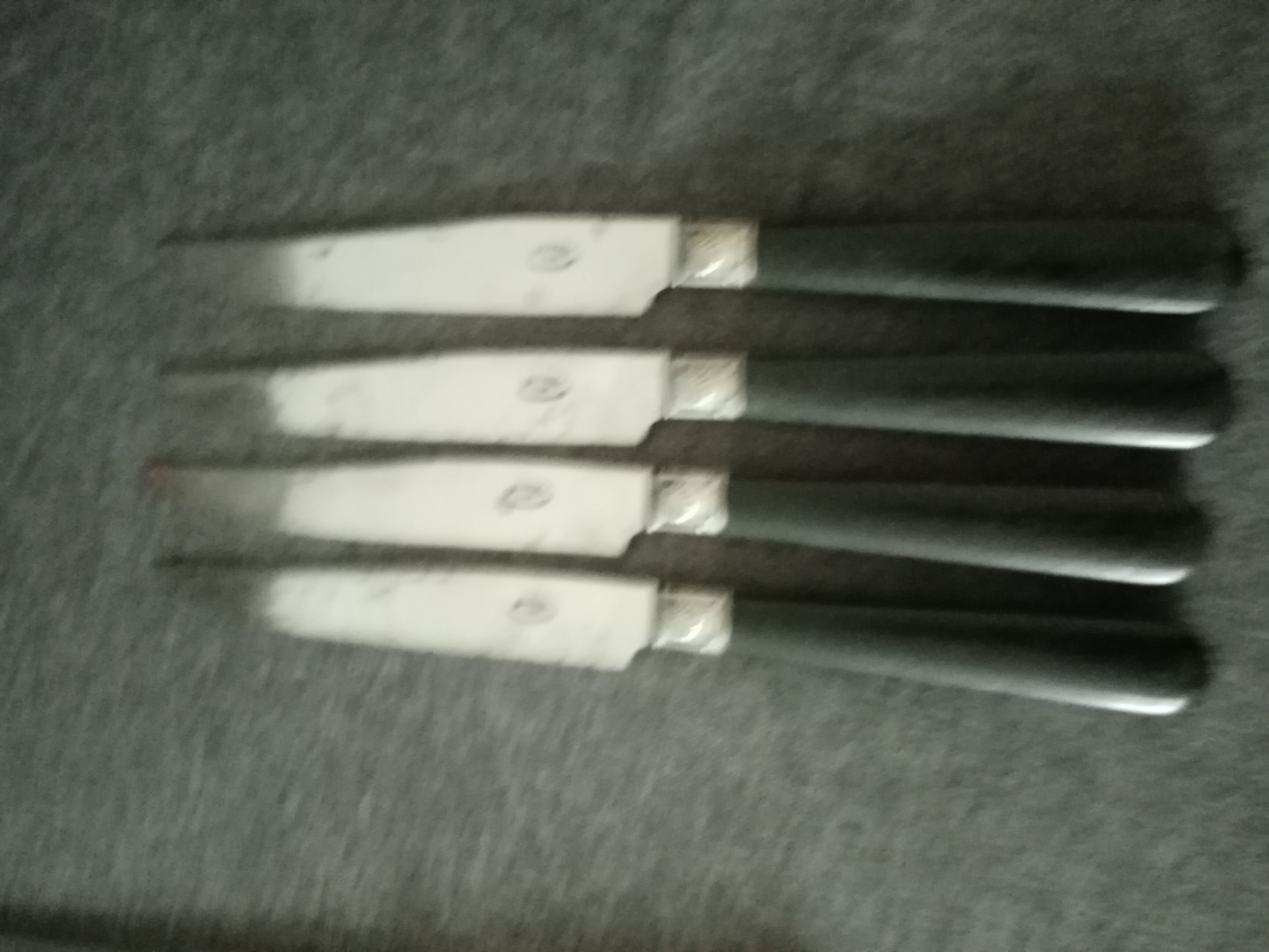 Suite of 4 Napoleon III table knives