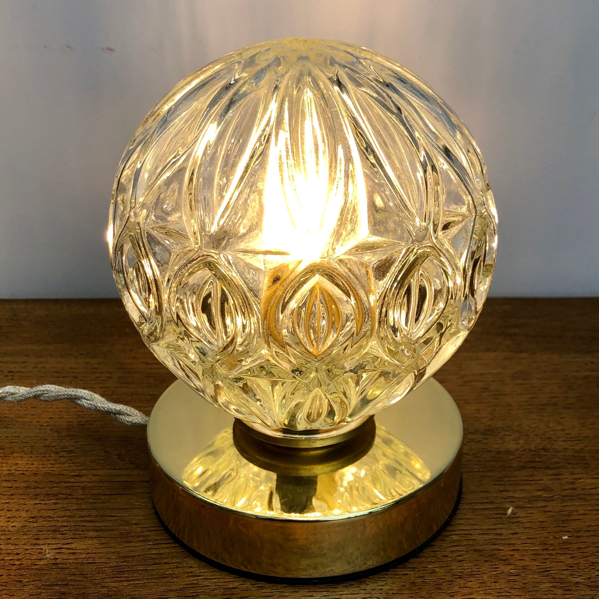 Vintage moulded glass globe-laying lamp