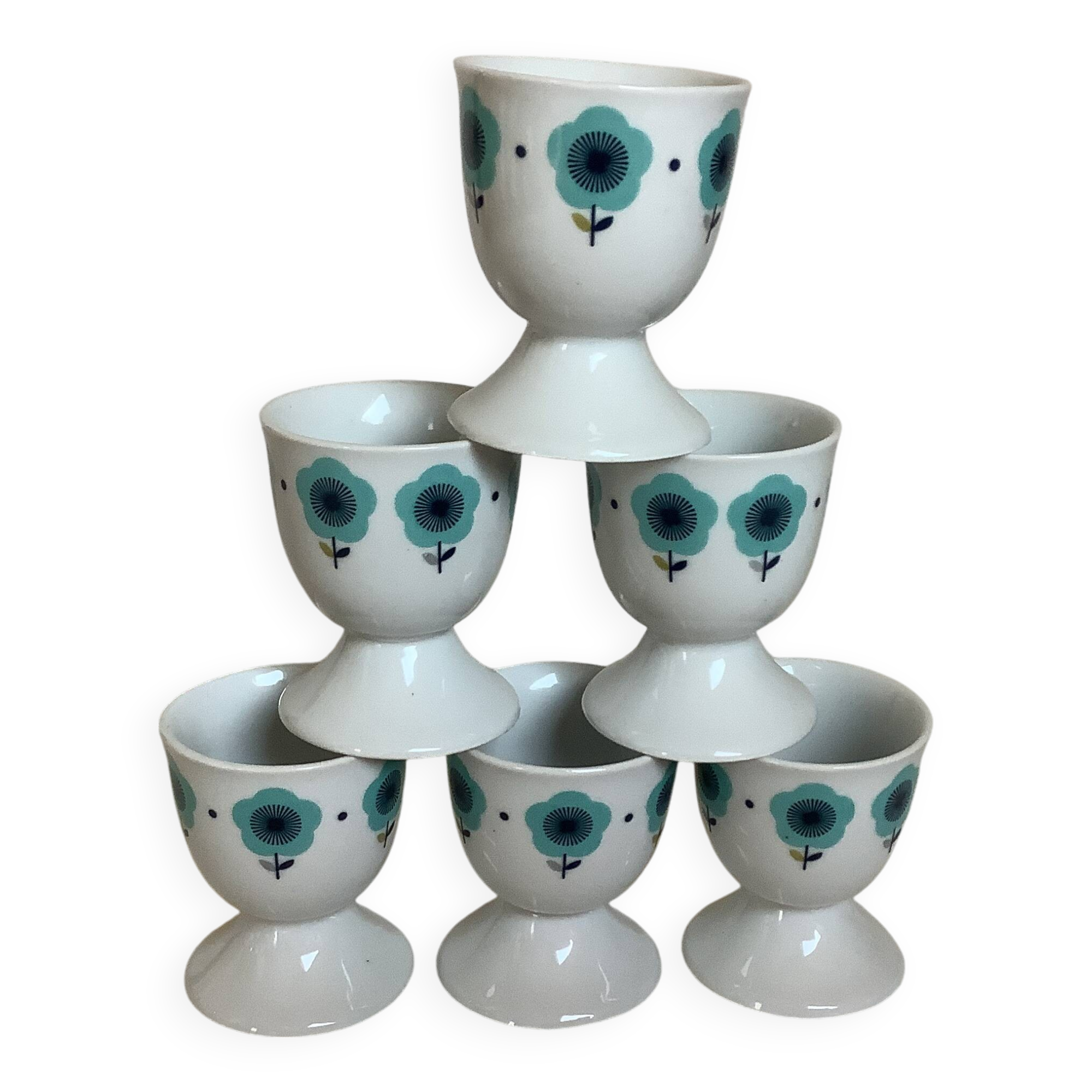 Six blue flower egg cups