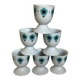 Six blue flower egg cups
