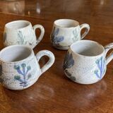 Ensemble de quatre tasses à café. Gustave Reynaud.