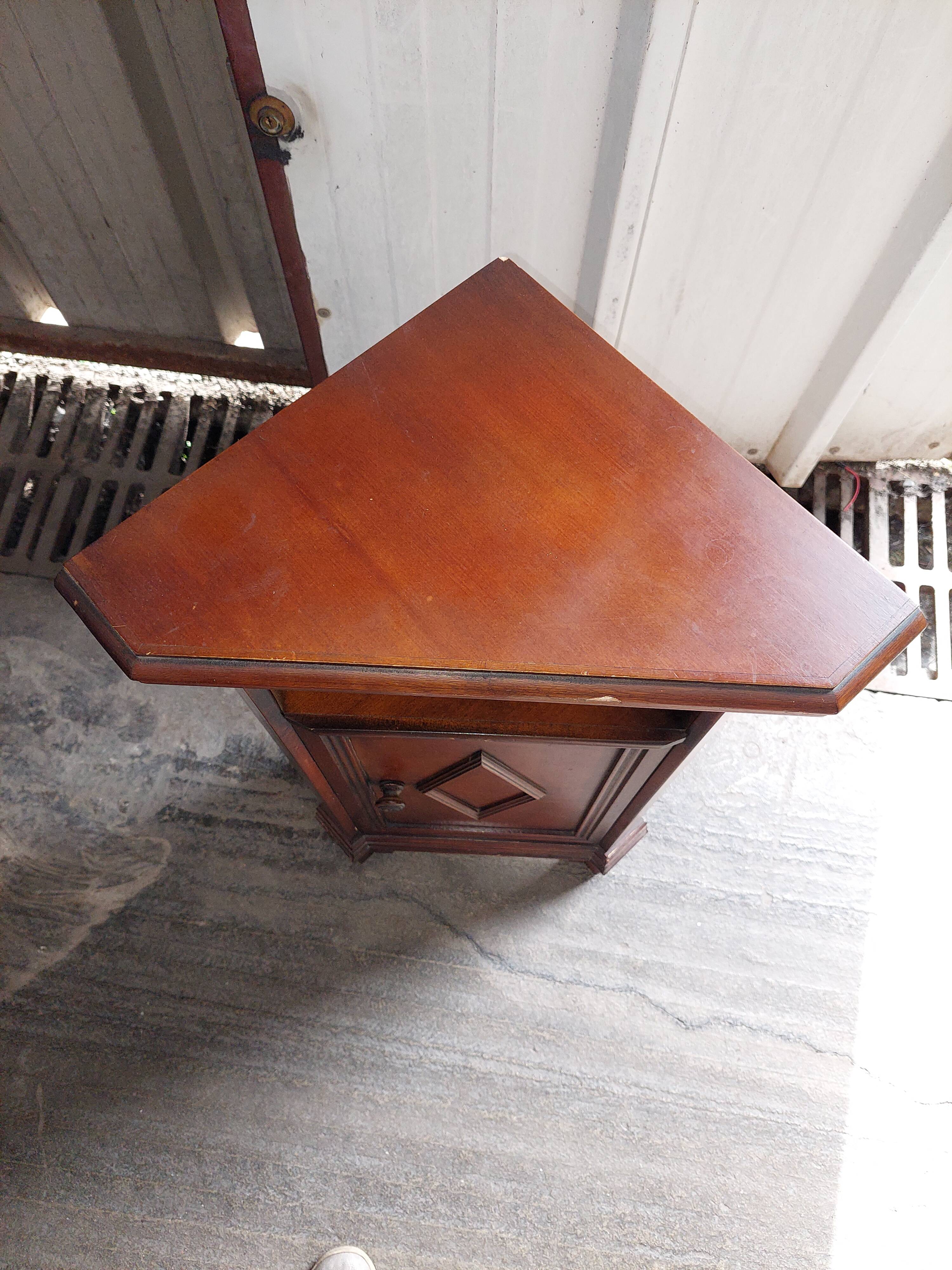 Small corner furniture in vintage wood used