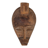 Masque tribal africain sculpté du 20e siècle