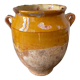 Old grease pot in glazed yellow terracotta, France nineteenth century