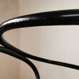 Curved wood and cane armchair called "Le Corbusier"