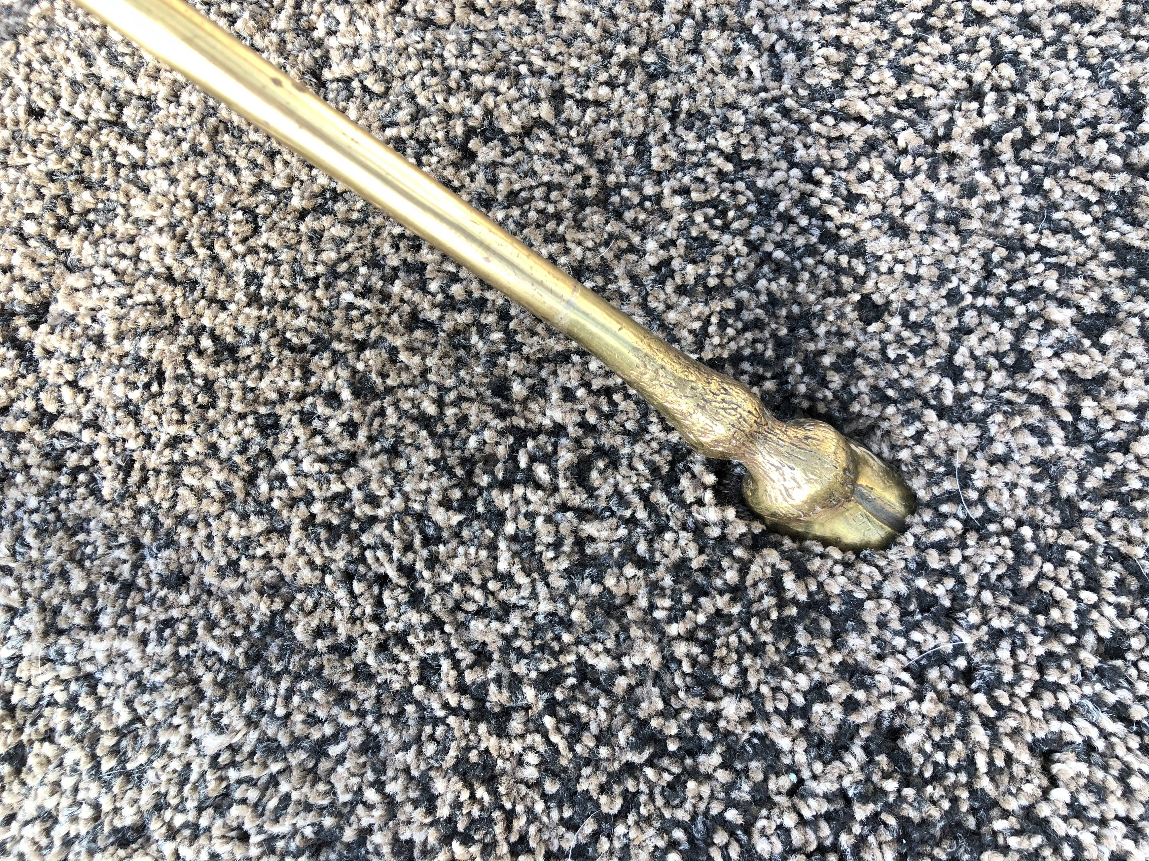 Glass and brass coffee table with hoof-shaped tripod legs, 1970