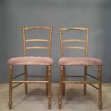 Pair of upholstered chairs in gilded wood