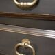 Cherry wood chest of drawers with 5 drawers in aged black.