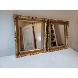 Pair of wood and gilded stucco mirrors
