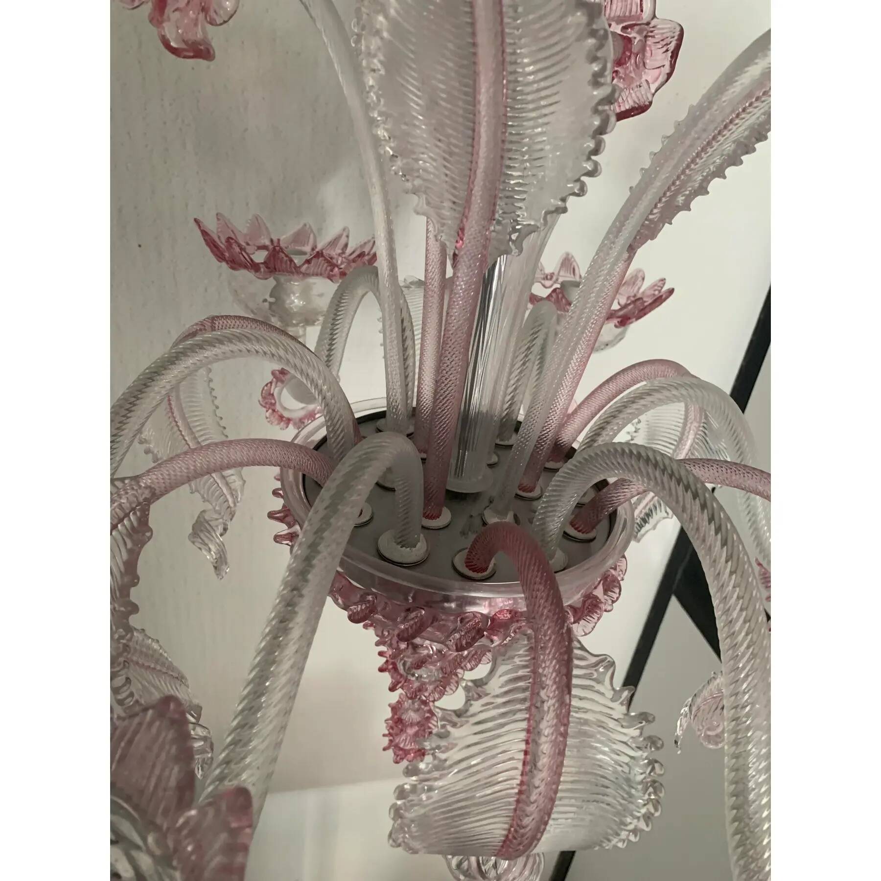 Chandelier in transparent and pink Murano-style glass with flower and leaf.