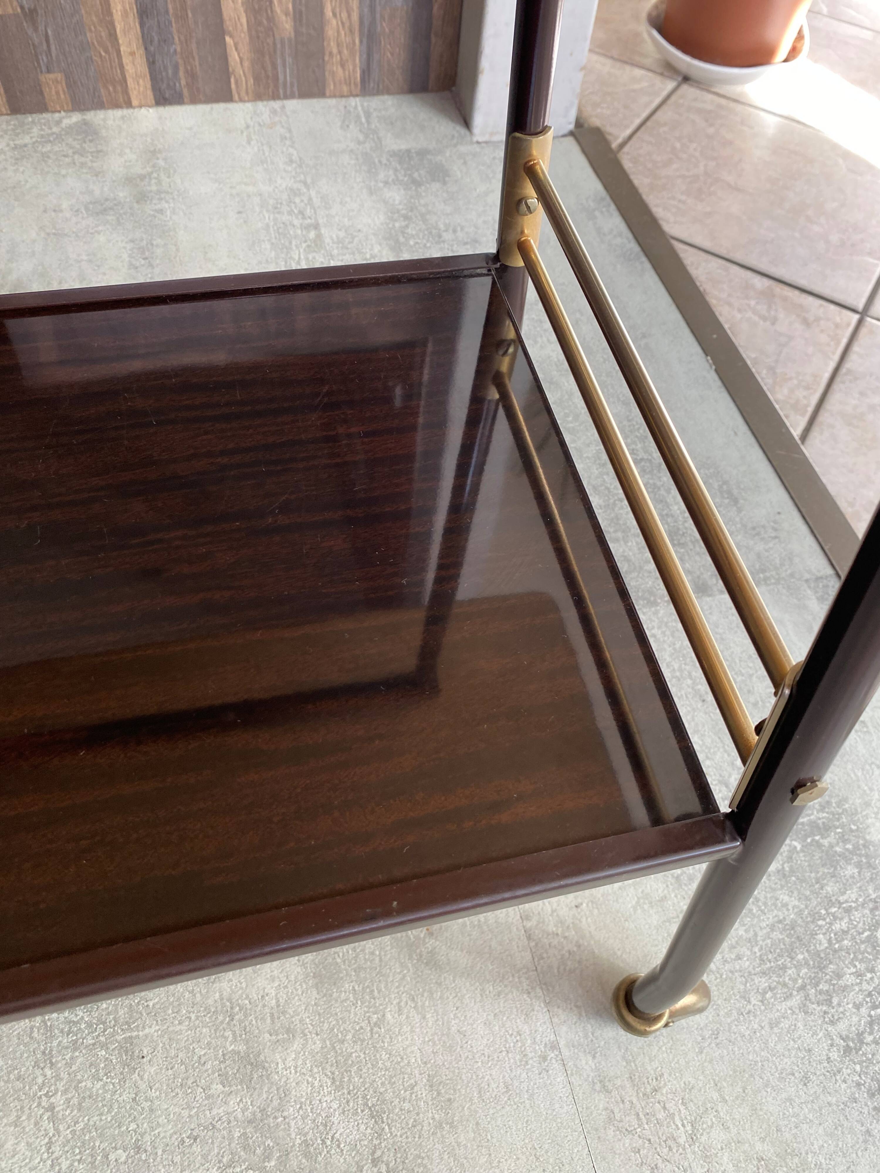 TV stand on casters, 2 brown Formica shelves, 1960s