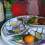 Three vintage free-form ceramic ravine dishes from the 1950s