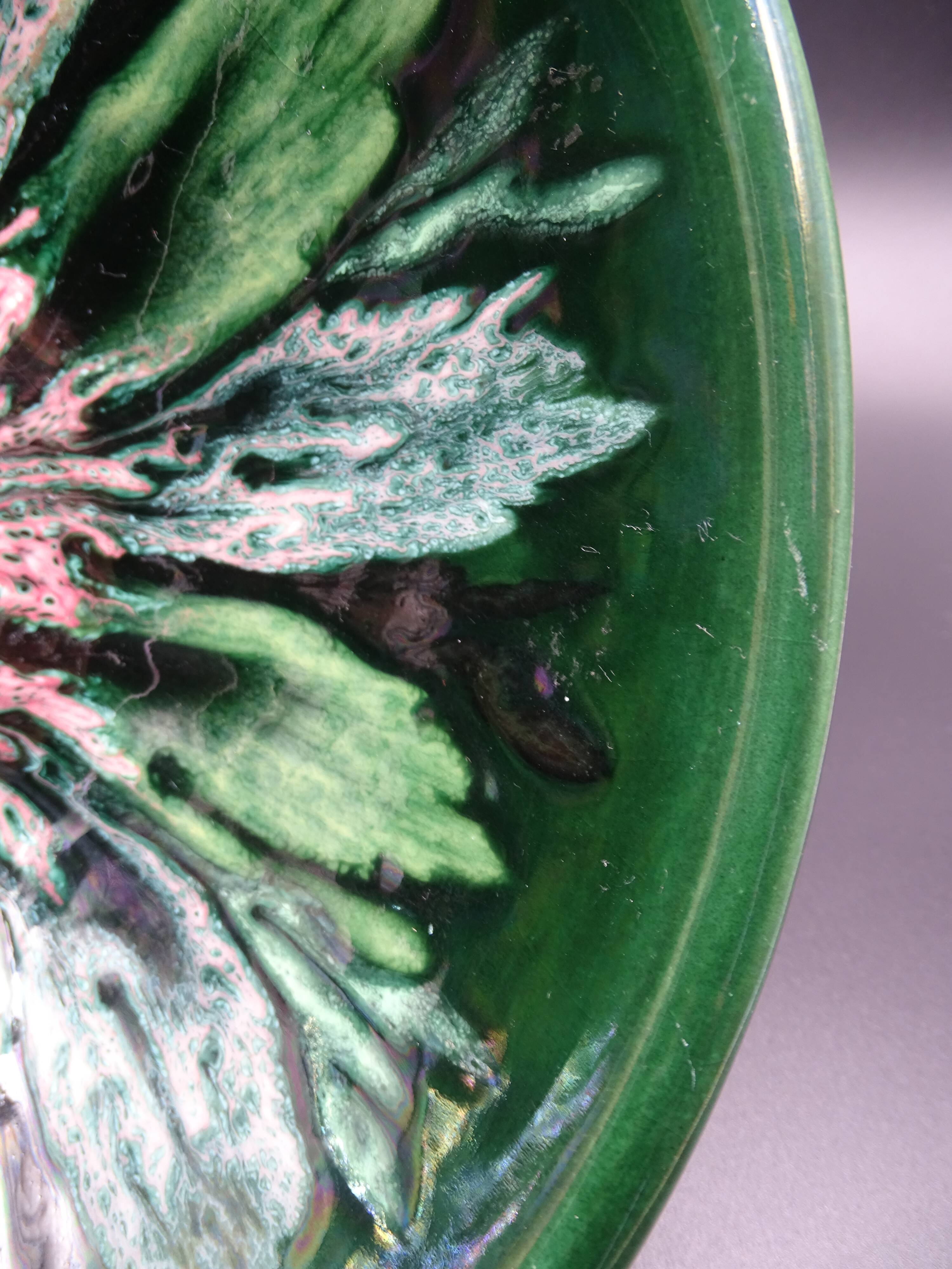 Green faience bowl decorated with multicolored drips around 1970