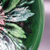 Green faience bowl decorated with multicolored drips around 1970