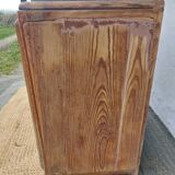 Vintage wooden buffet with a marble top.