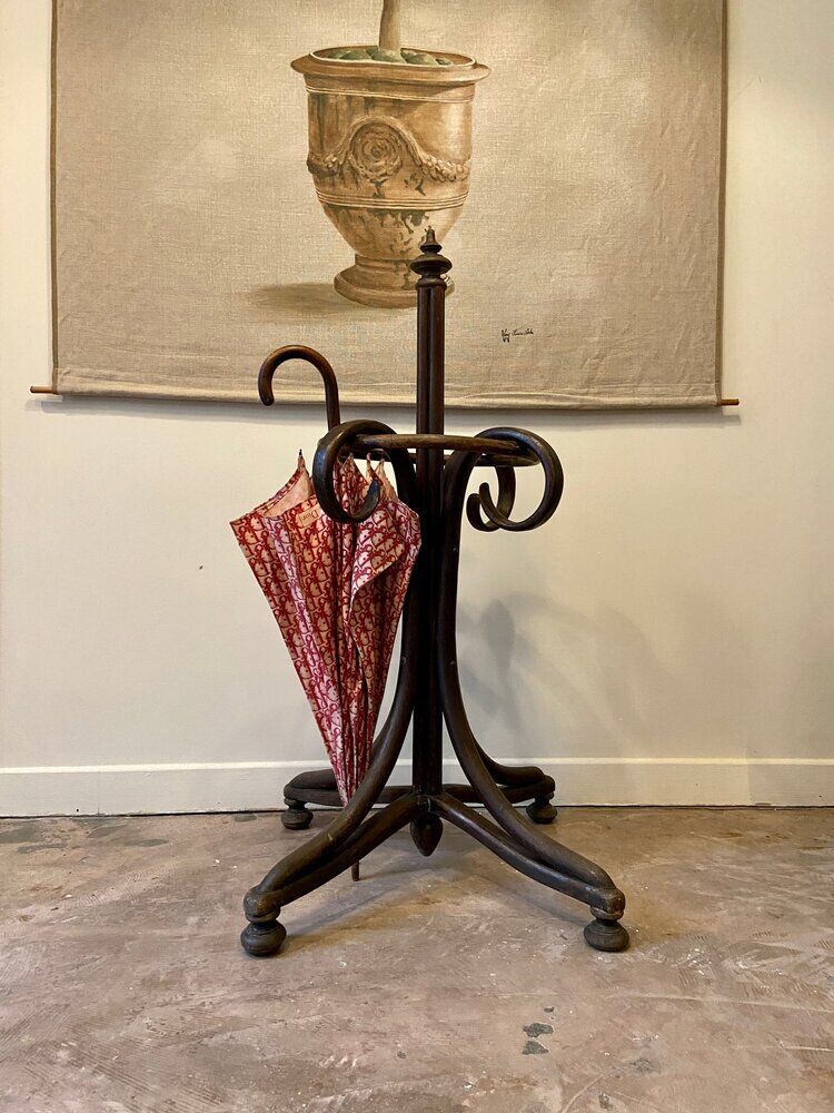 Umbrella holder in arched and dark wood