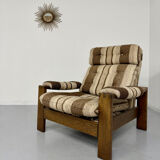 Vintage 1970s design armchair made of wood and fabric.