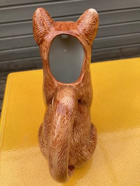 Ceramic jug in the shape of a fox.
