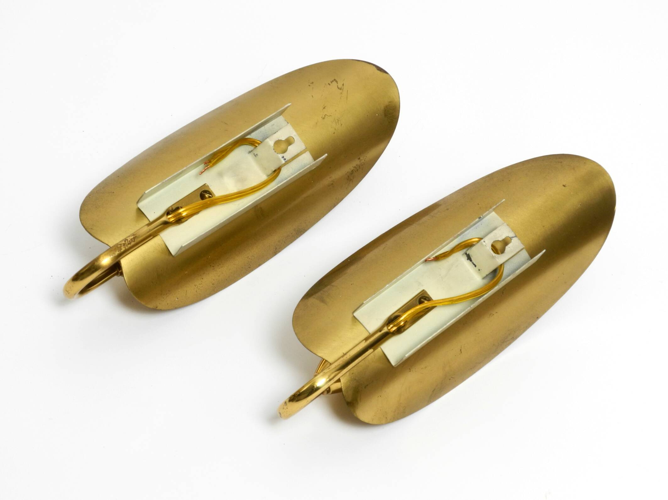 Two magical original Mid Century Modern bag brass wall lamps