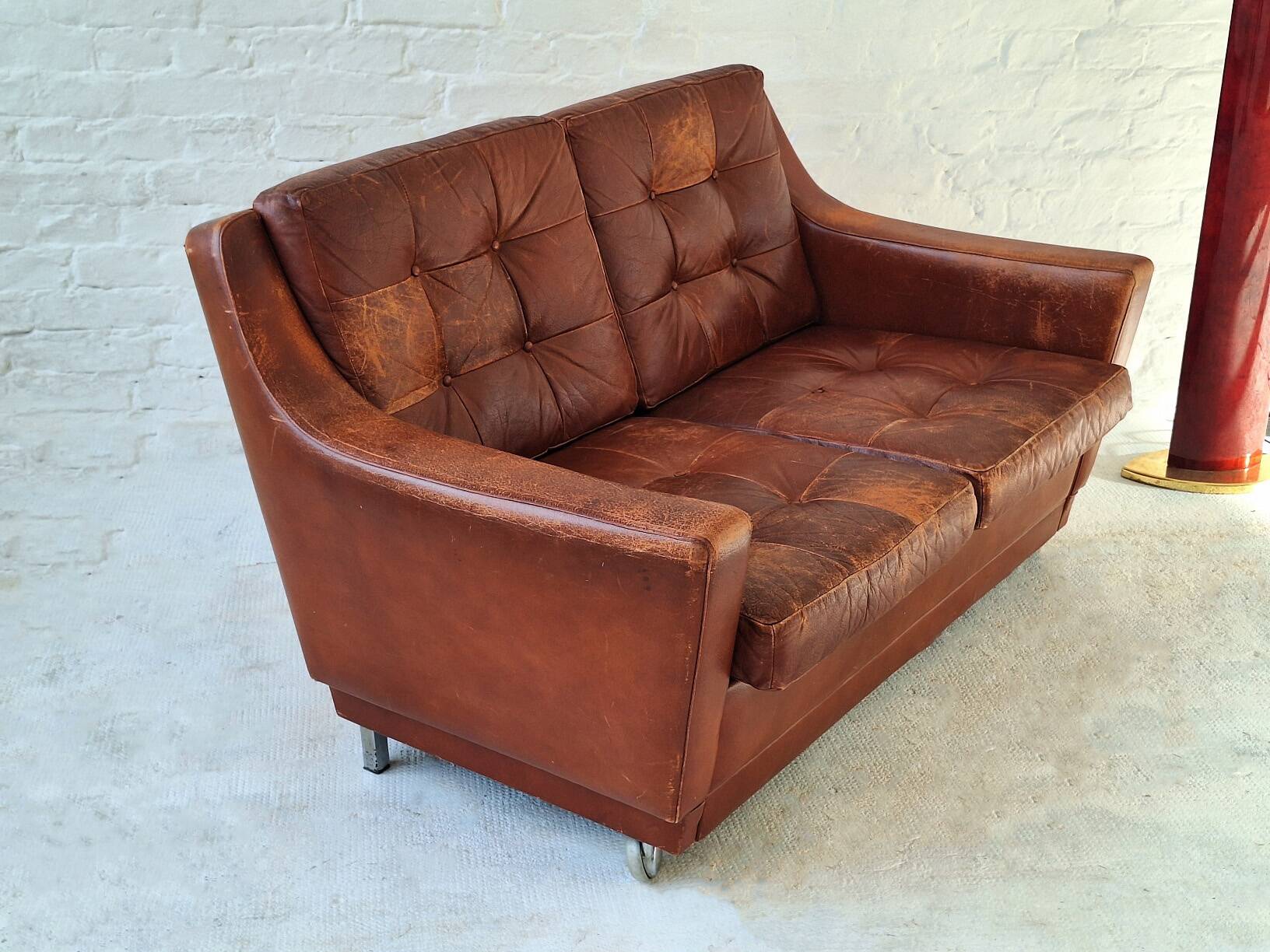 Mid century patchwork tufted patinated leather sofa, 1960s