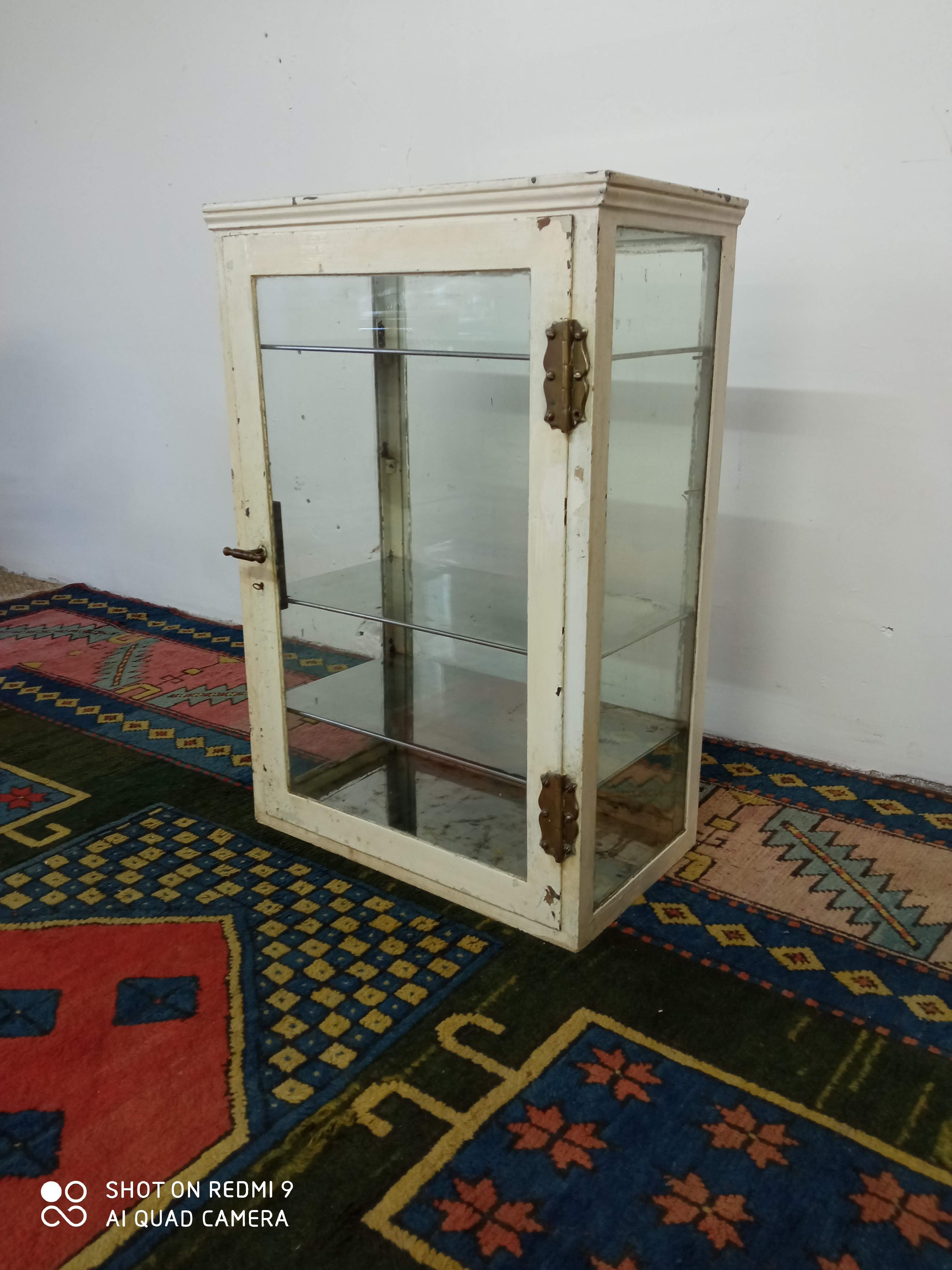 Ancient medical showcase in metal